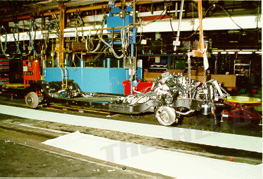 factory11.gif - Chasis with engine & trans installed