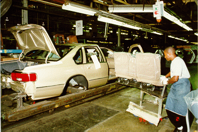 factory18.gif - Seat installation in a plain jane Caprice