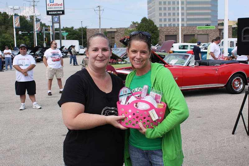 IMG_0719.JPG - Cynthia Tzemopoulos (right) wins the "Girl's Basket" presented by Bobby Tressel (left), Herd Treasurer