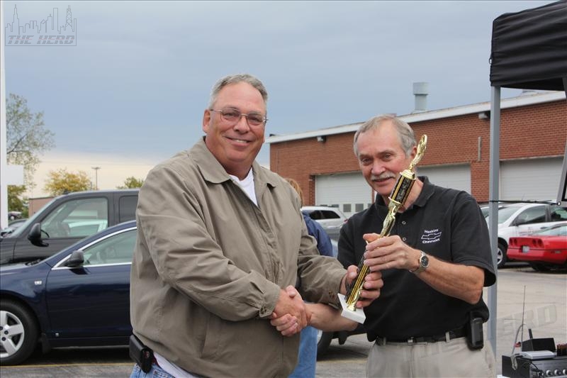 smIMG_7035.JPG - Burt Neuner receives the Stock Outstanding